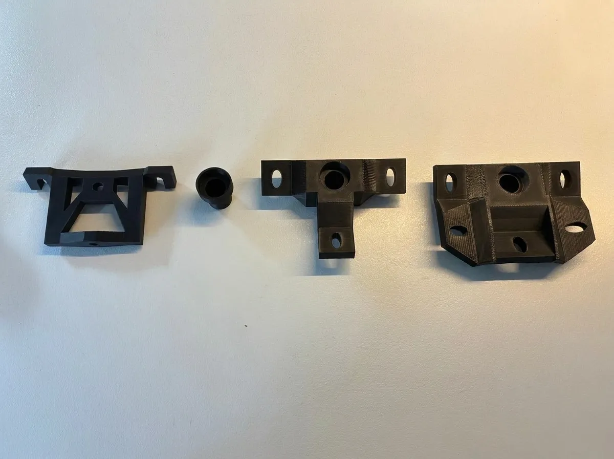 Iterations of telescope mounting piece